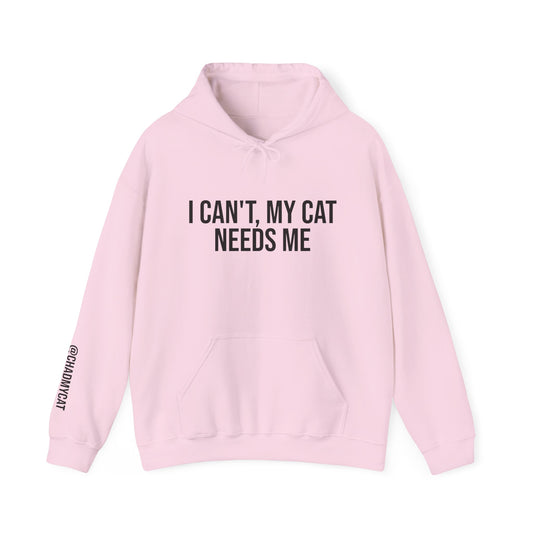 "I can't, my cat needs me" Unisex Heavy Blend™ Hooded Sweatshirt